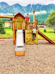 Area giochi per bambini di Feriendorf X-Alp Lodges Ötztal