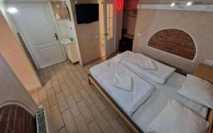 Postel nebo postele na pokoji v ubytování Sun Hotel