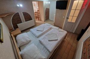 Postel nebo postele na pokoji v ubytování Sun Hotel