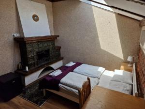 Postel nebo postele na pokoji v ubytování Sun Hotel