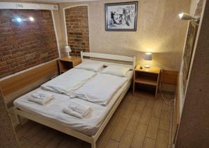 Postel nebo postele na pokoji v ubytování Sun Hotel