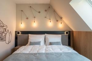 Posteľ alebo postele v izbe v ubytovaní Malom és Kacsa Boutique Hotel