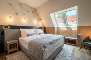 Posteľ alebo postele v izbe v ubytovaní Malom és Kacsa Boutique Hotel