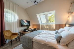 Posteľ alebo postele v izbe v ubytovaní Malom és Kacsa Boutique Hotel