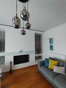 A seating area at ISLAND Time Deluxe Apartment Downtown 3 floors