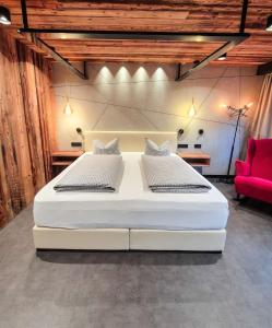 Postel nebo postele na pokoji v ubytování Boutique Hotel beim Lipp - Restaurant & Spa