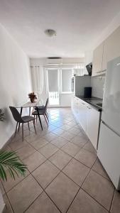 Kuchyň nebo kuchyňský kout v ubytování Apartment Barbin