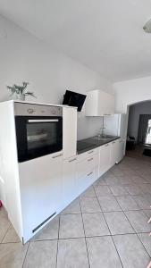 Kuchyň nebo kuchyňský kout v ubytování Apartment Barbin