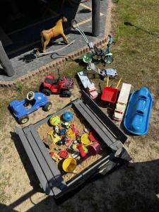 a table with toy cars and toys in a sandbox at Pokoje Gościnne Ontario Mieroszyno in Jastrzębia Góra +88 photos