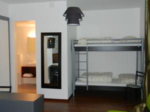 Katil atau katil-katil dalam bilik di Hôtel Terminus
