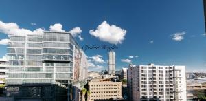 a view of a city with a tall building at Opulent Heights- Westpoint Sandton in Johannesburg