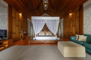 Postel nebo postele na pokoji v ubytování Plataran Komodo Resort & Spa - CHSE Certified + 37 fotografií