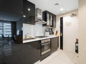 Gallery image of Comfortable Studio Stay in Damac Maison Canal View - 04 in Dubai
