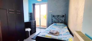 Posteľ alebo postele v izbe v ubytovaní Apartmani Oaza