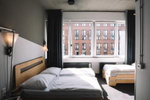 Voodi või voodid majutusasutuse Superbude Hamburg St Georg toas