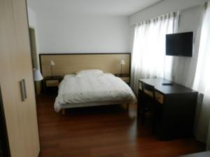Katil atau katil-katil dalam bilik di Hôtel Terminus