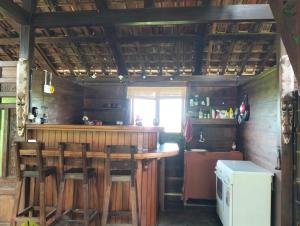 Lounge nebo bar v ubytování Di Kubu YR + 15 fotografií