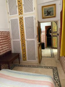 Postel nebo postele na pokoji v ubytování Riad dar Rhamna