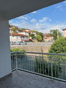 a balcony with a view of a street at Apartment MJ in Čapljina
