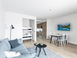 Posezení v ubytování Holiday Home Lomahuoneisto 45 by Interhome