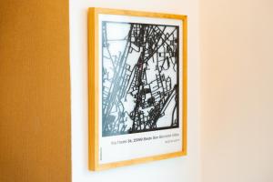 a picture of a framed picture of a tower at Metro M1 - Stylish Loft Retreat in Sesto San Giovanni