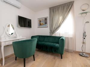 Μια τηλεόραση ή/και κέντρο ψυχαγωγίας στο Apartment Mihaela-1 by Interhome