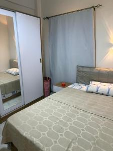 Ένα ή περισσότερα κρεβάτια σε δωμάτιο στο Sidi-Abdelrahman twin house Orchidia 4 bedrooms