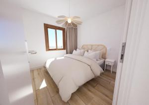 Postel nebo postele na pokoji v ubytování Mas Boronat Resort