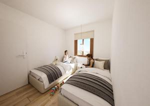 Postel nebo postele na pokoji v ubytování Mas Boronat Resort