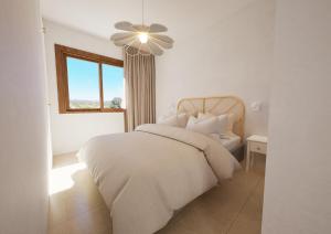 Postel nebo postele na pokoji v ubytování Mas Boronat Resort