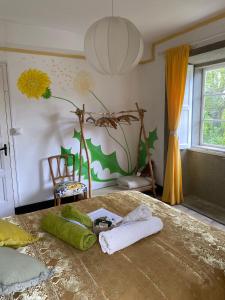 Ein Bett oder Betten in einem Zimmer der Unterkunft Casa SanAndo Integrative Medicine Treat & ReTreat Center