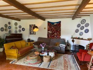 Ein Sitzbereich in der Unterkunft Casa SanAndo Integrative Medicine Treat & ReTreat Center