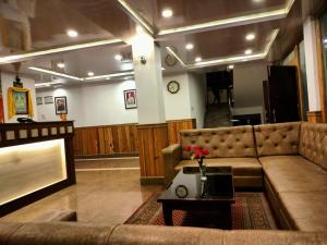 Posezení v ubytování Dragon Inn-A unit of AR Hotels