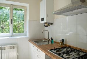 Kuchyň nebo kuchyňský kout v ubytování Casa Magnolia + 60 fotografií