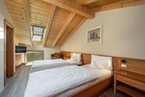 Voodi või voodid majutusasutuse Excelsior Dolomites Life Resort toas