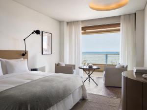 Кровать или кровати в номере Grecotel Astir Palace