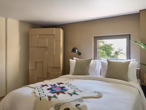 Кровать или кровати в номере Grecotel Astir Palace