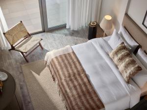 Кровать или кровати в номере Grecotel Astir Palace