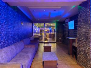 Predel za sedenje v nastanitvi Ivy Hotel Awolowo