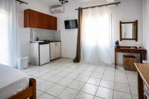 Kuchyň nebo kuchyňský kout v ubytování Galini Apartments