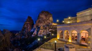 a view of a mountain at night at Caldera Cave Hotel & Restaurant in Uçhisar