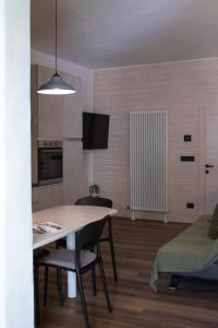 Televisyen dan/atau pusat hiburan di Le Calle Holiday Apartments
