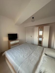 Ένα ή περισσότερα κρεβάτια σε δωμάτιο στο Suba's Apartment +32 φωτογραφίες