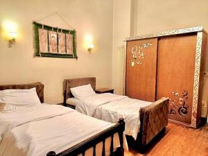 Postel nebo postele na pokoji v ubytování Bab el khair Hostel