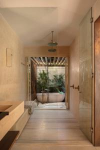 Koupelna v ubytování NABOA Hotel Tulum