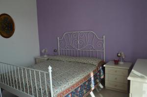 Postel nebo postele na pokoji v ubytování Il Melograno