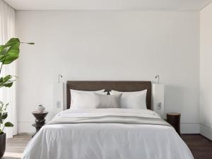 Кровать или кровати в номере Grecotel Astir Palace