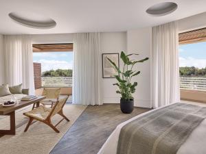 Кровать или кровати в номере Grecotel Astir Palace