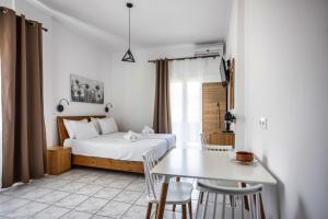 Postel nebo postele na pokoji v ubytování Galini Apartments + 28 fotografií