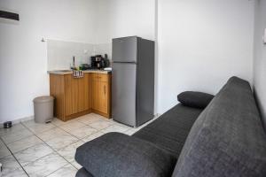 Kuchyň nebo kuchyňský kout v ubytování Galini Apartments